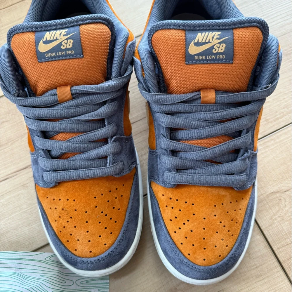 Nike Men's Low-Top Sneakers in Navy, Orange, and Cream